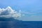 The hazy and mountainous coastline of the Caribbean Island of Haiti as a cruise ship sails by
