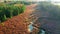 Hazy river, swamps and forest in autumn, aerial view