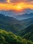 Hazy silhouette of mountains against a sunset