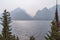 Hazy smoke in the air from nearby summer wildfires in the Grand Teton National Park in Wyoming, at Jenny Lake