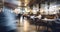 A Hazy Snapshot of Patrons in a Busy Coffee Haven. Blurred restaurant background with some people and chefs and waiters working.