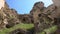 HD fooage. Abanoned houses in rocks. CLose up. Handheld camera