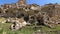 HD fooage. Abanoned houses in rocks. Handheld camera