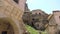 HD fooage. Abanoned houses in rocks. Handheld camera