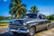 HDR - American black vintage car parked before the beach in Varadero Cuba - Serie Cuba Reportage