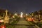 HDR long exposure night image of a small village cemetery in Paskov with decorations and candles burning on All Saints Day in CZ