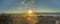 HDR Panorama of midnight sun seen from the peak of Nuolja in Northern Sweden