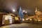 HDR photo of the first ever traditional Christmas markets at the Prague castle behind the Metropolitan Cathedral of Saints Vitus