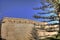 HDR photo of Mdina city historic walls on a sunny summer day. Mdina is the former historic capital of the Malta island