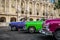 HDR - Threeamerican convertible vintage cars parked in series in Havana Cuba before the gran teatro - Serie Cuba Reportage