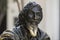 Head of bronze statue of El Caballero de Paris with shiny beard at Square Francis Assisi, Cuba