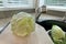 Head of Cabbage on Chopping Board