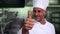 Head chef giving thumbs up and smiling at camera