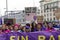 Head of the feminist march and group of protesters concentrated with a protest banner in one of the main streets of central Madrid