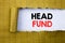 Head Fund. Business concept for Investment Funding Money written on white paper on the yellow folded paper.