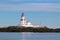 Head harbour Lightstation with Minke whale in the foreground