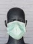 Head image of mannequin wearing a surgical mask