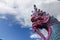 Head of Naga statue and blue sky. Naga statue,Sculpture of serpent and blue background