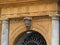 Head of an old man above a door of an ancient building to Palermo in Sicily, Italy.