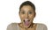 Head portrait of young happy and excited hispanic woman 30s in surprise and astonished face expression eyes and mouth wide open is