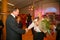 The head of the Priozersk district Sergey doroshuk presenting flowers from the admirers of Belarusian singer Alexander Solodukha.