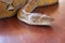 Head python yellow pattern on a table edge. Close up of snake skin texture use for background. Portrait of a Albino reticulated