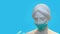 Head of sculpture of an antique woman in medical surgical mask and gloves as coronavirus prevention for hygiene corona