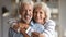 Head shot portrait of happy old retired family couple,