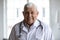 Head shot portrait of old therapist in white coat uniform