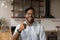 Head shot portrait overjoyed African American man showing thumb up