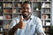 Head shot portrait satisfied African American man showing thumb up