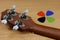 Head of Ukulele and colorful guitar pick on wood background
