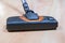 Head of Vacuum Cleaner sweeping laminate floor