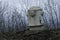 The head of the ventilation shaft of the bomb shelter in a gloomy landscape