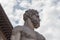 Head of white sculpture Hercules and Cacus at the entrance of the Palazzo Vecchio in the Piazza della Signoria, Florence, Italy