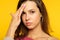 Headache migraine woman forehead hand pain meds