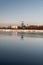 Headframe od Ful Darkov bituminous coal mine reflecting on water fround of Karvinske more lake near Karvina city in Czech republic