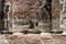 Headless Buddha ruins at the temple