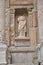 A headless statue adorns the front of the celebrated library at Ephesus