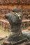 Headless statue in Wat Mahathat temple,