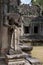 Headless warrior statue at Preah Khan temple in Angkor Wat, Cambodia