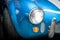 Headlight Detail of Blue Classic car