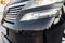 Headlight of Toyota Vellfire japanese luxury minivan car in black color on the parking with seven passenger seats