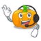 With headphone yellow pumpkin isolated in the cartoon