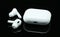 Headphones Apple Air Pods Pro 2 with Wireless Charging Case on black background. AirPods are wireless Bluetooth earbuds designed