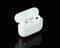 Headphones Apple Air Pods Pro 2 with Wireless Charging Case on black background. AirPods are wireless Bluetooth earbuds designed