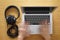 Headphones and laptop for modern working