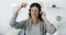 Headphones, music and face of woman dance in living room, happy and fun in her home. Smile, podcast and portrait of