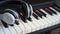 Headphones on musical synthesizer keyboard. Headphones on electronic piano