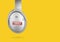 Headphones with podcast icon isolated on yellow background